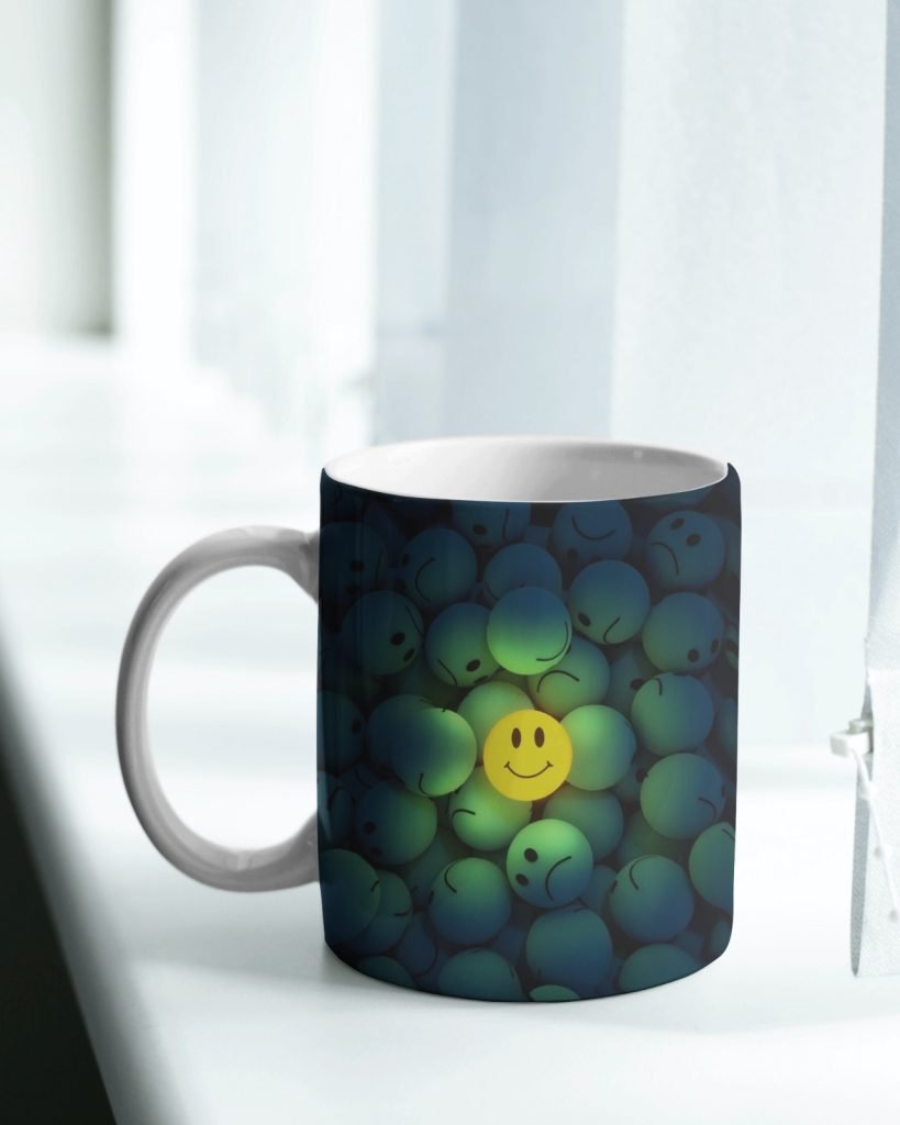 Smiley Coffee Mug with a cheerful yellow face on durable ceramic.