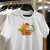 Close-up view of a variety of Happy Holi T-Shirt designs showcasing vibrant colors and festive messages.