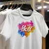 A model wearing a colorful Holi ki T-Shirt with a traditional motif