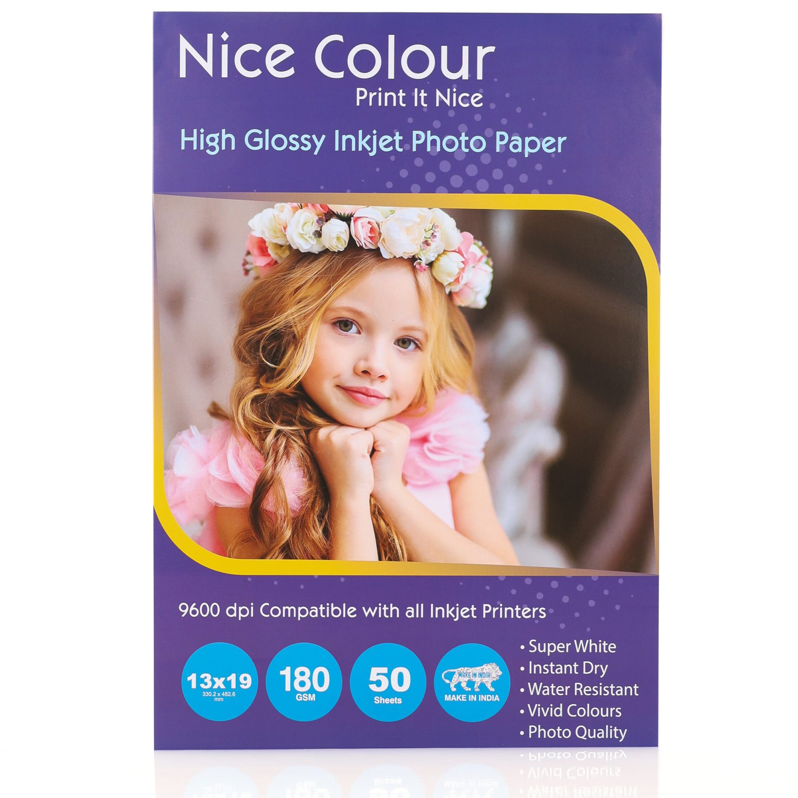 High Glossy Inkjet Photo Paper 13x19 Inch 180GSM 50 Sheet 10 A stack of "High Glossy Inkjet Photo Paper 13x19 Inch 180GSM 50 Sheet" highlighting its smooth, reflective surface, next to an inkjet printer, with a printed 13x19 inch photograph showcasing vibrant colors and impressive detail.