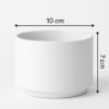 A personalized ceramic planter pot, 10 cm diameter, 7 cm height, featuring a custom design and a small succulent plant.