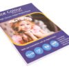 A stack of "High Glossy Inkjet Photo Paper 12x18 Inch 210GSM 50 Sheet" showcasing its thick, brilliant surface, positioned next to a high-resolution inkjet print displaying vibrant colors and sharp detail.