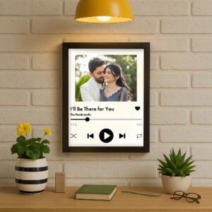 A sleek 8x12 inch customized Spotify frame with a matt finish, displaying a personalized album cover image, song title, artist name, and a scannable Spotify code