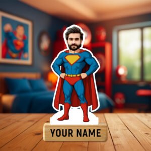 A "Personalized Superman Caricature Standee" featuring a custom face on a classic Superman body in a blue suit and red cape, mounted on a wooden base with "SUPERMAN" inscribed, set against a bedroom backdrop.