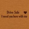 A rectangular light brown "MDF keychain" with rounded corners, engraved with "Drive Safe I need you here with me"