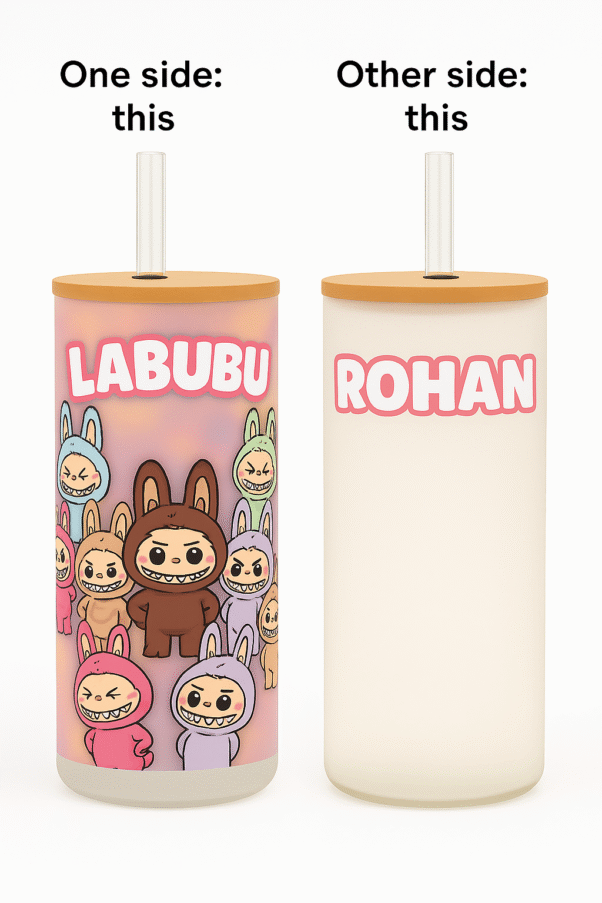 Two views of a Custom Name Labubu Tumbler for Kids: one side shows "LABUBU" text with multiple Labubu characters, the other side shows the personalized name "ROHAN." Both tumblers have a wooden lid and a clear straw.
