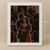 A white-framed Customized Couple Picture Frames with a collage of couple photos, featuring a large cutout of the couple in the center, placed on a desk next to a plant and a mug.