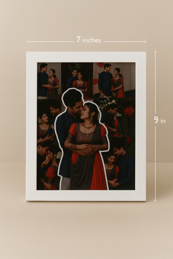 A white-framed Customized Couple Picture Frames with a collage of couple photos, featuring a large cutout of the couple in the center, placed on a desk next to a plant and a mug.