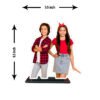 A "Brother Sister Personalized Caricature Stand" featuring a custom cutout of a young boy and girl smiling, designed for tabletop display, set against a bright indoor background with flowers.