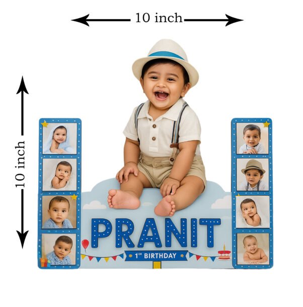A Wooden cutout photo for baby customized featuring a smiling baby (Pranit) sitting on a cloud-shaped base, flanked by two blue vertical panels with four small baby photos each, and text indicating "PRANIT 1st BIRTHDAY" with balloons and a cake icon.