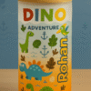 A white and orange gradient Personalized Dinosaur Tumbler for Kids with a bamboo lid and clear straw, featuring colorful illustrations of various dinosaurs, leaves, anchors, and the text "DINO ADVENTURE" and a vertical custom name "Rohan."