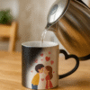 Personalized couple magic mug revealing a full-color illustration of a loving couple with hearts floating around them.