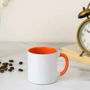 Orange and white ceramic coffee mug