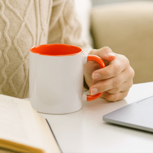 Orange and white ceramic coffee mug