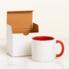 Personalized Red and White Coffee Mug with Name or Logo and a vibrant red interior and handle. The mug is shown in a dynamic setting, highlighting its bold, eye-catching style.