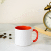 Personalized Red and White Coffee Mug with Name or Logo and a vibrant red interior and handle. The mug is shown in a dynamic setting, highlighting its bold, eye-catching style.