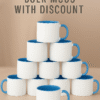 Personalized Blue and White Coffee Mug with Name with a white exterior and a blue interior and handle, sitting on a wooden desk.