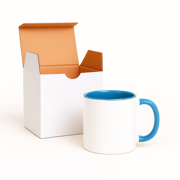 Personalized Blue and White Coffee Mug with Name with a white exterior and a blue interior and handle, sitting on a wooden desk.