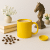 Personalized Yellow Coffee Mug with Name or Logo with a glossy finish on a desk with a vase of daisies, books, and a globe in the background.