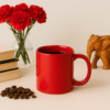 Personalized Red Coffee Mug with Name or Logo finish on a wooden table with coffee beans and books in the background.