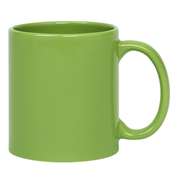 Custom Green ceramic coffee mug sitting on a wooden table, next to a vase with white flowers, a stack of books, and scattered coffee beans.